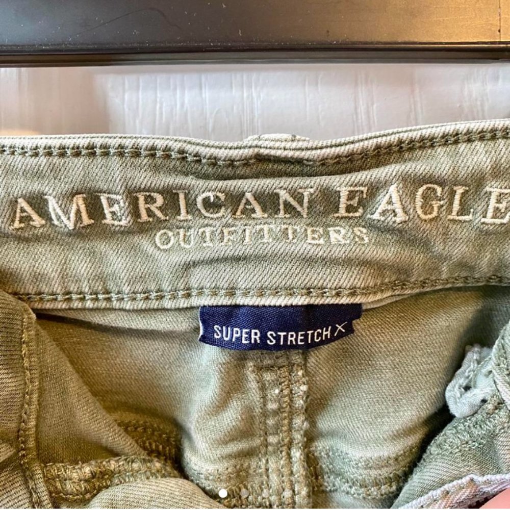American Eagle ripped olive jeans